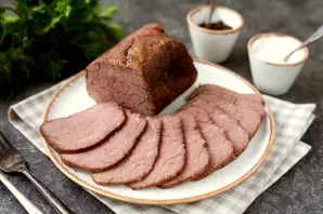 After some time, take the meat out of the oven, pierce the foil, drain the released juice. Cool the beef directly in the foil, send it to...