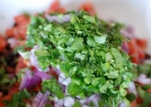 There are also finely chopped coriander.
