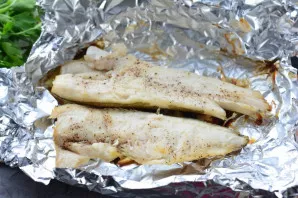 Bake the fish in foil for 25-30 minutes in the oven at 200 degrees.