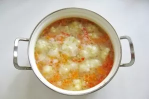 Salt the soup to taste and cook until all the ingredients are ready.