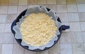 Put half of the crumbs in a baking dish.