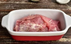 Transfer the roll to the baking sheet.