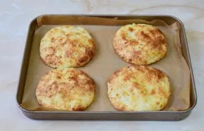 The curds will increase slightly and have a brown color. Remove them from the oven.