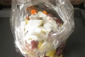 We put everything in a baking sleeve, pour sour cream, tie it up and put it in an oven preheated to 180 degrees for 1 hour.