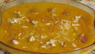 Now you need to add water to the form with cutlets so that the liquid reaches half the cutlets. Then pour in the sauce and put the choppe...