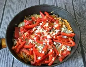 Add garlic, chili pepper and bell pepper.