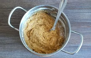 Stir in the flour with a spoon. You will get a thick, viscous dough.