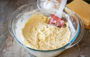 My cottage cheese is quite dry, so it took only 50 grams to get a viscous curd mass with active stirring.