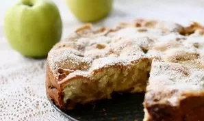 We bake in a well-heated oven for about half an hour. Preparation for checking with a toothpick - if it is dry, then an ordinary apple pi...