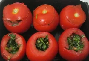 Ready-made stuffed tomatoes can be decorated with greens or simply covered with a previously cut lid - in any case, they will look appeti...