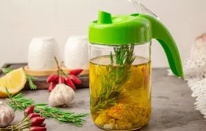 Store the oil in a dark and cool place. You can store in the refrigerator, but shake the jar before use.