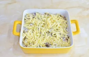 Sprinkle grated cheese on top and place in the oven. Cook fish with mushrooms for 35-40 minutes at a temperature of 180 degrees. Follow y...