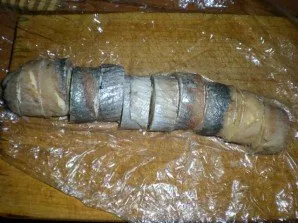 Carefully unwrap the roll and cut into portions.