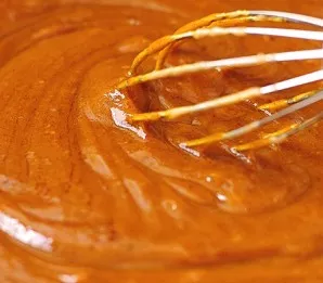 Mix everything thoroughly until smooth. If necessary, you can add a little more lemon juice or water.