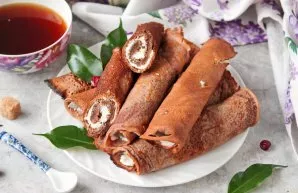 Chocolate pancakes with curd filling ready! Enjoy your meal!