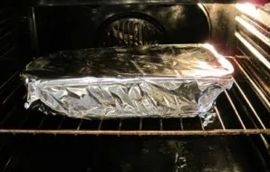 We put the form with ribs and potatoes in a preheated oven. You can cover the form with foil, but this is not necessary. Bake for 40 minu...