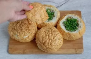 And add greens according to your taste. Cover the sandwiches with the cut top of the bun.