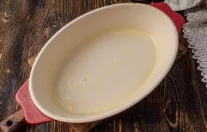 Grease the other half of the melted butter on a baking sheet.