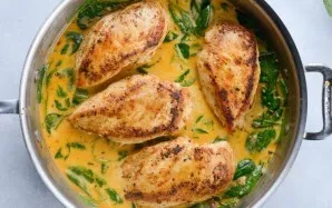 Add the chicken. Cover the pan with a lid.