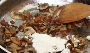 Add butter, melt it and add flour, mix.