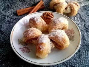 Bake buns for 25-30 minutes until golden brown. If desired, sprinkle the buns with powdered sugar. Delicious!