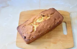 The cake will slightly increase in size and become golden brown in color. Remove it from the mold and cool.