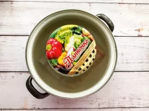 For sterilization, take a large saucepan with a thick bottom and put a towel in it. Put the jars, cover with lids, pour clean water, put ...