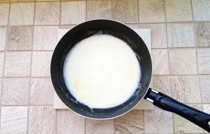 Gradually pour in the milk and stir constantly until the sauce thickens. It will take a few minutes. Add salt to taste.