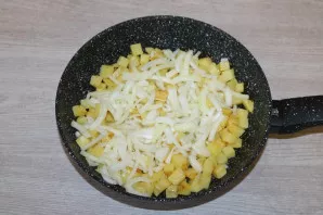 Add the onion, fry together over medium heat for 1-2 minutes.