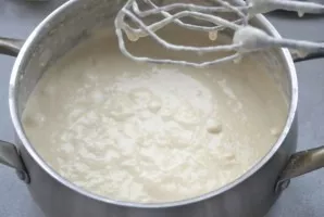 Beat the dough with a mixer until smooth.