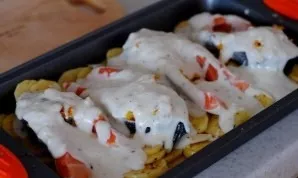 Add the sauce last. It is advisable to cover not only the fish with the sauce, but also the potatoes. And we put the dish to bake in an o...