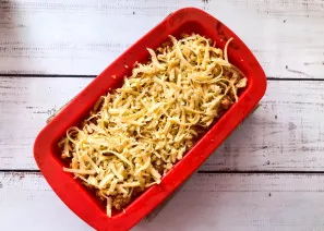 Place a sheet of lasagna, minced meat on top of the cheese, cover with sour cream and sprinkle with cheese again. Do the same process wit...