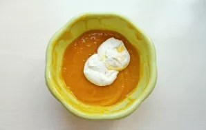 Add a little whipped cream to the puree and mix.