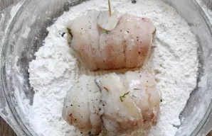 Roll each roll in flour.