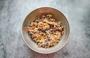 Add dried fruit to the dough and mix.