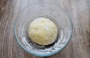 Knead a soft and non-sticky dough. Put it in a deep bowl and cover it.