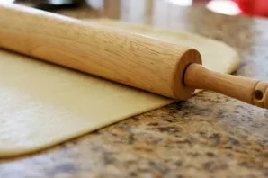 Roll out the dough in a fairly thin layer.