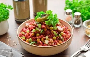 Salad with beets and pickled cucumbers is ready. Enjoy your meal!