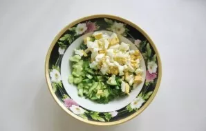 Put a hard-boiled, sliced egg.