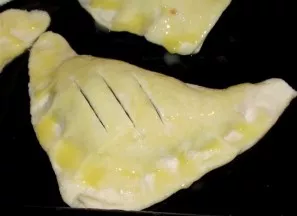 Brush each cake with egg yolk. We make several small cuts at the top to let the steam out. Bake in the oven for 15-20 minutes, temperatur...