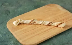 Twist each strip into a string.