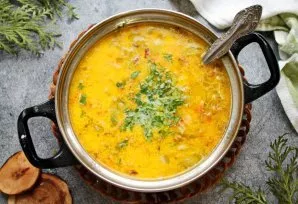 Add chopped herbs. Bring the soup to a boil and remove from heat.