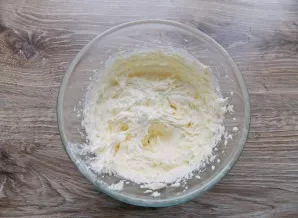 Add vanilla to soft butter and beat until fluffy.