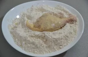 Then roll again in a dry mixture, straining off excess flour. Fry when the oil is hot enough.