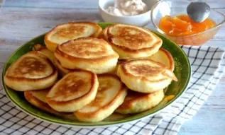 Pancakes are lush, reddish, appetizing. Serve them with sour cream, jam or condensed milk. A great option for breakfast, will please the ...
