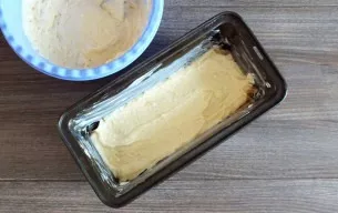 Take a baking dish, grease it with butter or cover it with baking paper. Divide the dough into three parts. Place one part of the dough i...