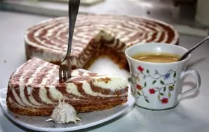 To make it easier to remove the cake from the mold, you will need to slightly warm the sides of the mold. For example, you can simply blo...