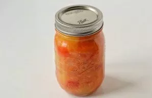 Put the snack in sterilized jars, close the lid. Turn over, wrap in a towel and leave to cool completely.