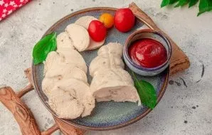 Cool the prepared chicken roll in the broth, remove and serve. Delicious!