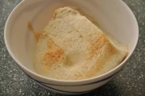 Pour milk or water over the baguette slices to soften them slightly.
